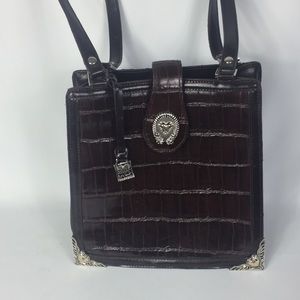 M. C. Leather purse